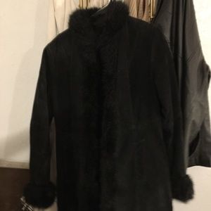 Mid length fur lined Suede coat.